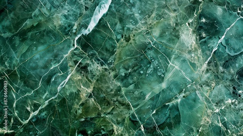 A high-resolution photograph of green marble with white veins