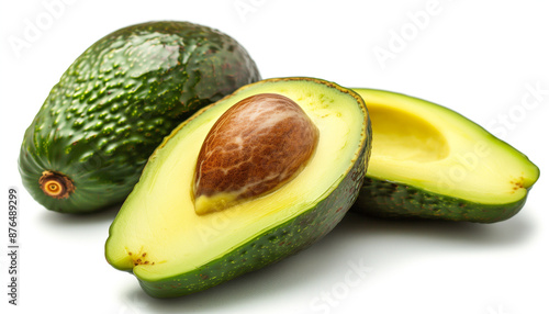Fresh avocado with one half showing the seed on a white background perfect for healthy eating and cooking