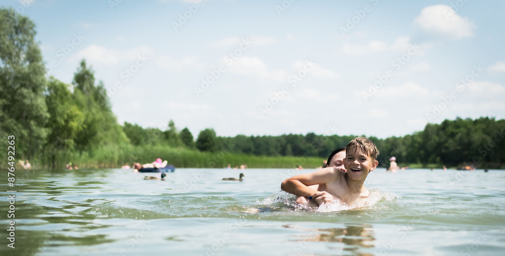Children swim and play in the lake Children swim and play in the lake