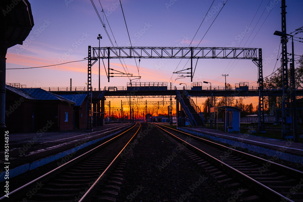 Fototapeta premium Sunset at railway station in Small Vishera, Leningrad oblast