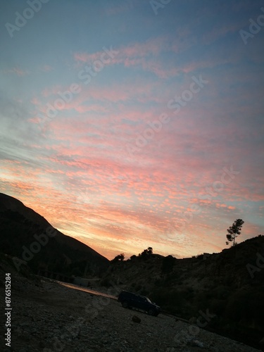 Experience the enchanting beauty of the magic hour with this stunning sunset photograph.