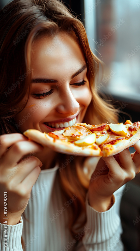 Happy woman eating pizza, smiling, facing camera, pizza in hand, happy woman looking down and eating pizza slice Happy woman eating pizza, smiling, facing camera, pizza in hand, happy woman looking down and eating pizza slice