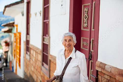 Senior woman tourist at the beautiful Heritage Town of Jerico located in the Department of Antioquia in Colombia. photo