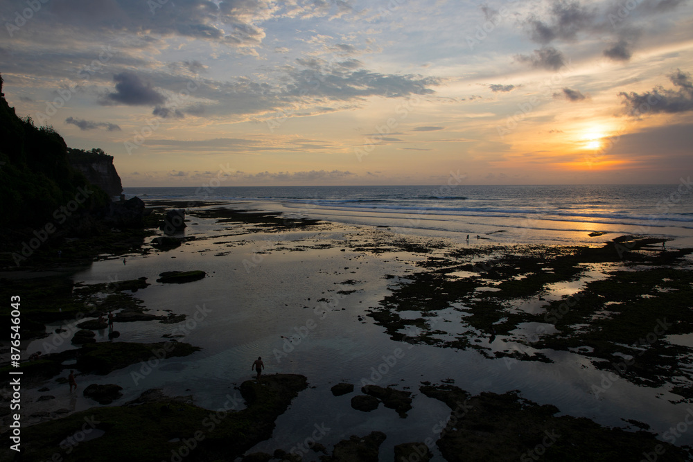 Beautiful view of Uluwatu Beach at sunset in Bali, Indonesia