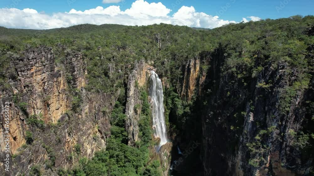 Drone video of giant waterfall, Águas Lindas waterfall, Canjica Complex, canyon, crystal clear green water, Chapada dos Veadeiros Goiás and Serras Gerais Tocantins Drone video of giant waterfall, Águas Lindas waterfall, Canjica Complex, canyon, crystal clear green water, Chapada dos Veadeiros Goiás and Serras Gerais Tocantins