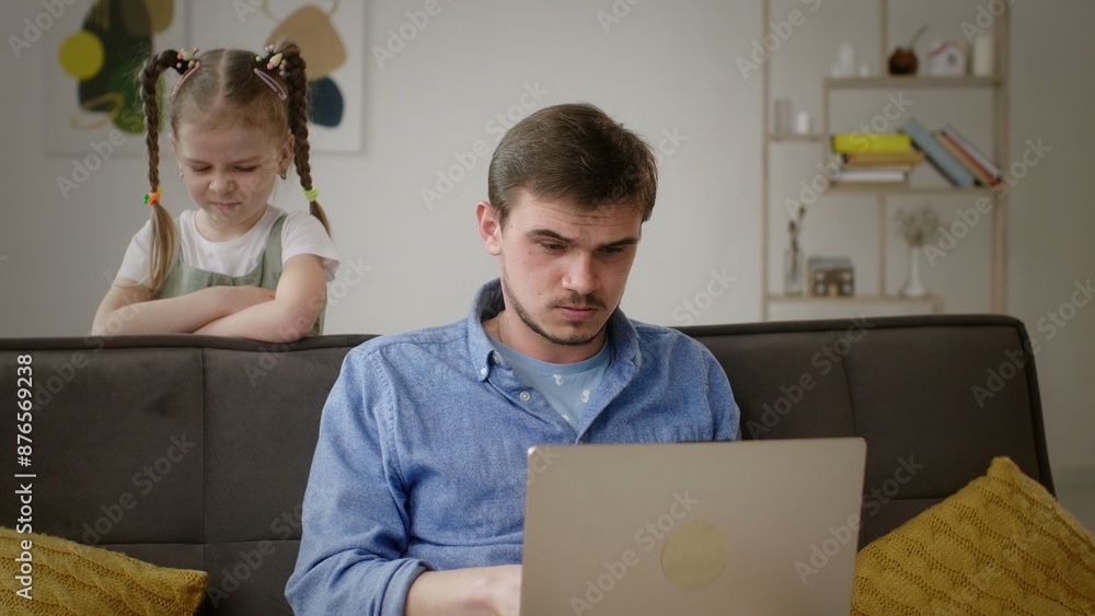 Frustrated Father Continues to Work as Daughter Seeks Attention at Home Frustrated Father Continues to Work as Daughter Seeks Attention at Home