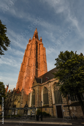 Sunset Glow on the Iconic Church of Our Lady (Onze-Lieve-Vrouwekerk) - Bruges, Belgium photo