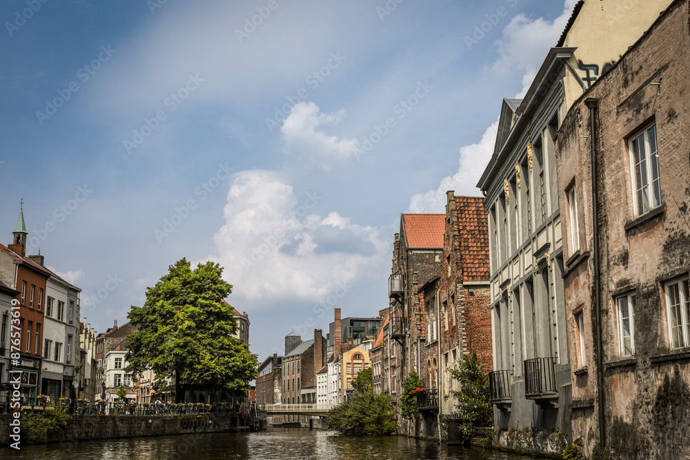 Naklejka premium Old Buildings and Bridges of Ghent seen from the Leie (Lys) River - Ghent, Belgium
