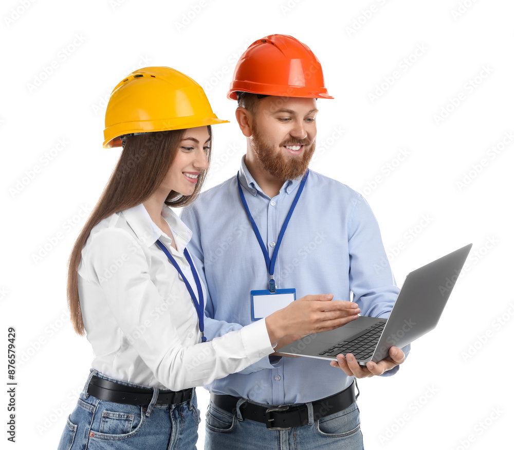 Engineers in hard hats with laptop on white background Engineers in hard hats with laptop on white background