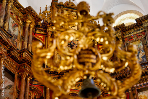 Figure of Christ seen through a golden crosier in the Cathedral of Cartagena de Indias, Colombia photo