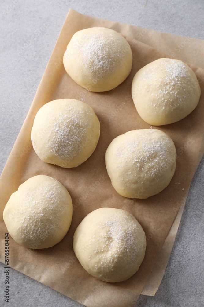 Raw dough balls on light grey table, top view Raw dough balls on light grey table, top view