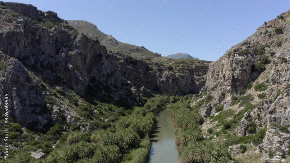 Drone flight over Preveli Beach at the end of the Kourtaliatiko Gorge, palm grove, south coast, Crete, Greece, Europe Drone flight over Preveli Beach at the end of the Kourtaliatiko Gorge, palm grove, south coast, Crete, Greece, Europe