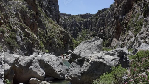 Drone flight through the Kourtaliatiko Gorge, Preveli Beach, palm grove, south coast, Crete, Greece, Europe photo