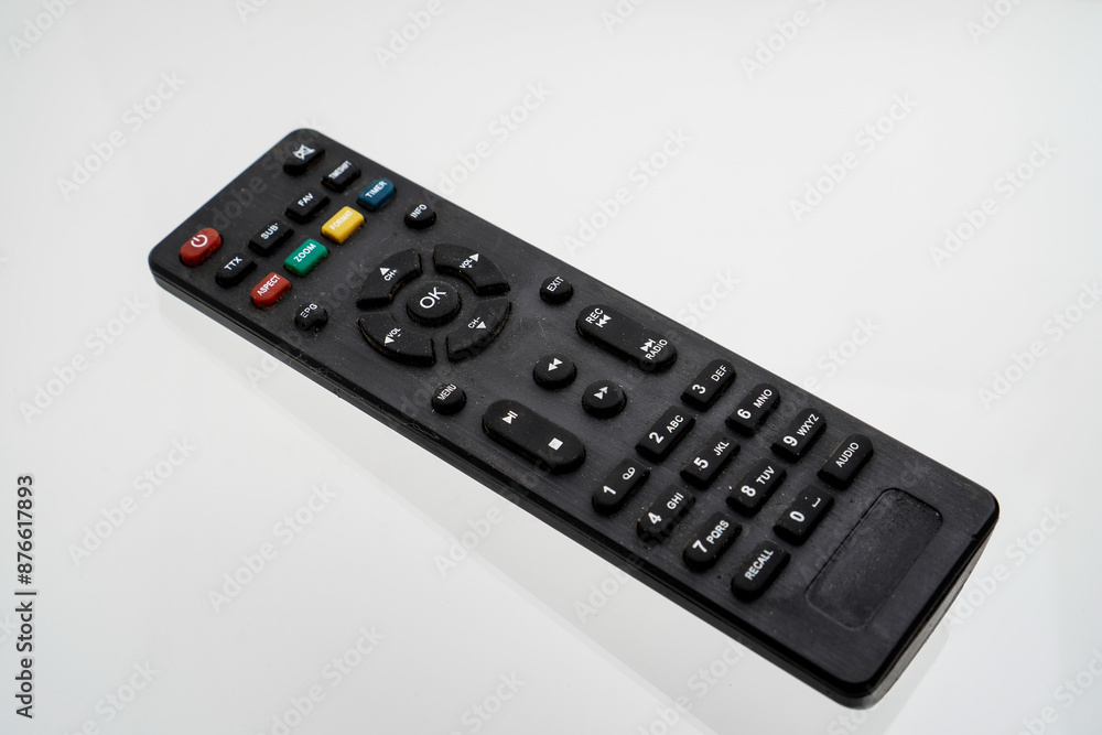 Close-up of remote control for television on white background with clipping path. tv remote isolated on white. Close-up of remote control for television on white background with clipping path. tv remote isolated on white.