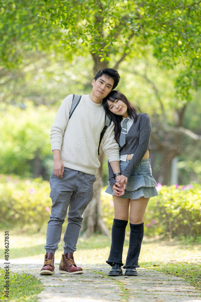 In March, with hydrangeas blooming, a Taiwanese woman in her twenties and a Hong Kong man are enjoying a walk together in a park in Zhongzheng District, Taipei City, Taiwan. In March, with hydrangeas blooming, a Taiwanese woman in her twenties and a Hong Kong man are enjoying a walk together in a park in Zhongzheng District, Taipei City, Taiwan.