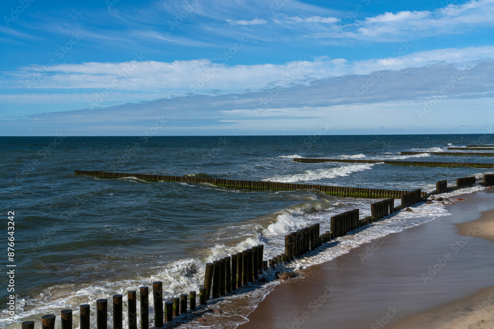 View of the Baltic Sea and wooden breakwaters of the city beach on a summer day, Svetlogorsk, Kaliningrad region, Russia View of the Baltic Sea and wooden breakwaters of the city beach on a summer day, Svetlogorsk, Kaliningrad region, Russia