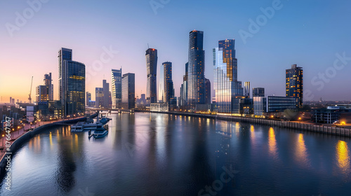 Wallpaper Mural Modern cityscape with sleek glass skyscrapers and waterfront promenades along a bustling river, illuminated by city lights at dusk Torontodigital.ca