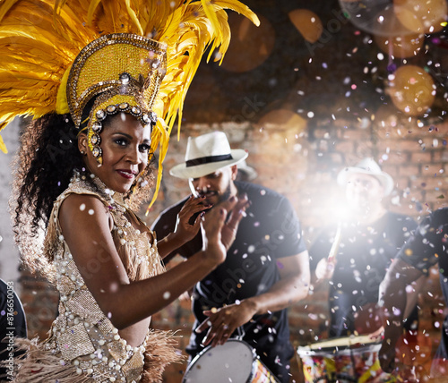 Woman, band and carnival as samba performance with music, parade and energy for celebration. Dancer, happy and traditional outfit at night party with culture and crowd for event in rio de janeiro photo