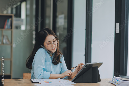 Asian woman working at the office. woman using laptop computer on desk at office