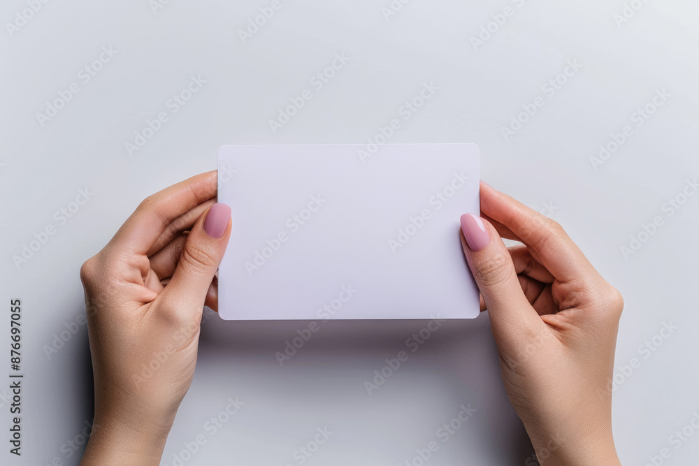 Obraz premium Holding blank paper in both hands