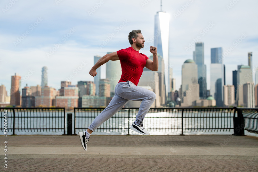 Runner training outside. Man run in NYC. Sport, jogging and running concept. New York City, Manhattan, Hudson, USA. Fitness sportswear. Outdoor Workout. Mature sportsman jogger. Healthy exercise. Runner training outside. Man run in NYC. Sport, jogging and running concept. New York City, Manhattan, Hudson, USA. Fitness sportswear. Outdoor Workout. Mature sportsman jogger. Healthy exercise.