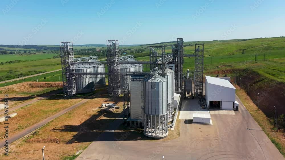 panoramic aerial view of Large grain elevator in a field on sunny day in summer panoramic aerial view of Large grain elevator in a field on sunny day in summer