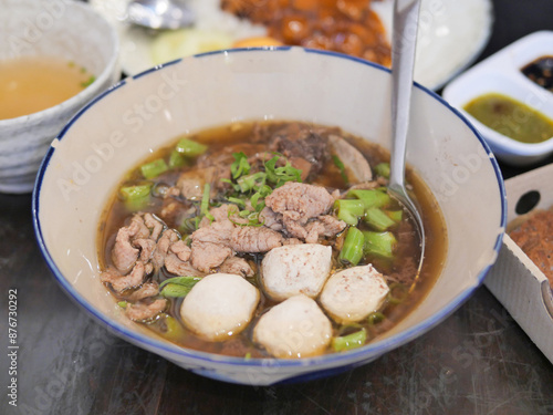 Thai Style brown soup, Boat Noodles with pork stew  and Pork meatballs soup,  