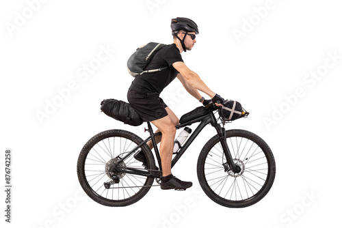 Cyclist on Touring Mountain Bike with Bags Isolated from Background