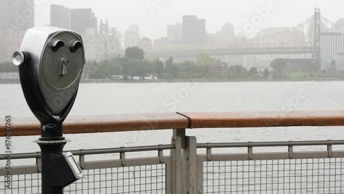 New York City waterfront skyline, Manhattan Midtown buildings, riverfront skyscrapers by East river. Waterside cityscape, tower viewer, Gantry Plaza. Long Island, Queens. United States tourism. Rainy.