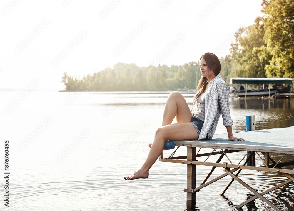 Fototapeta premium Woman, lake and thinking on holiday with adventure for wellness, outdoor freedom or journey to Indonesia. Female student, river or thoughtful for nature travel with water in summer, relax or vacation