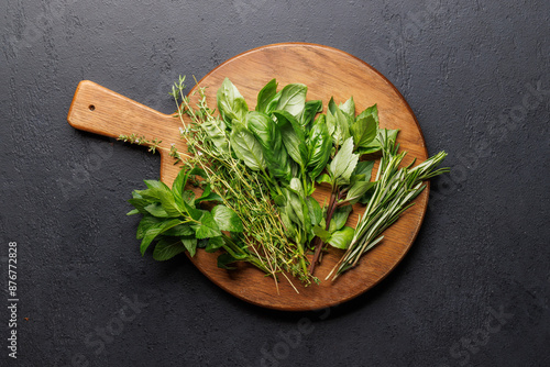 Various herbs on the board © karandaev