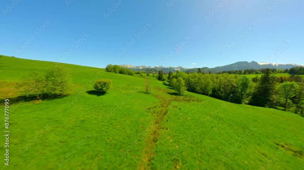 FPV flight over green pastures near Tatra mountains in summer, Poland FPV flight over green pastures near Tatra mountains in summer, Poland
