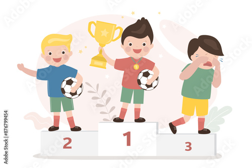 Schoolboys standing on podium. Boy holds winner cup and ball. Football players after competition, winner and losers. First place, reward for winner in championship