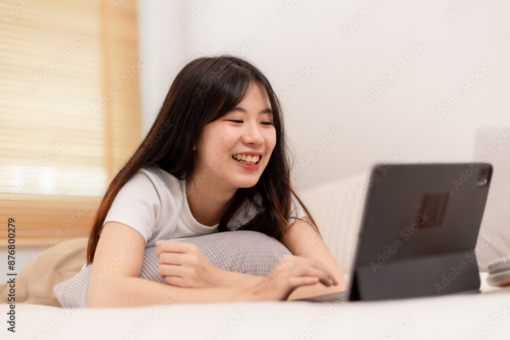 Happy woman from online media via smartphone. Happy woman from online media via smartphone.