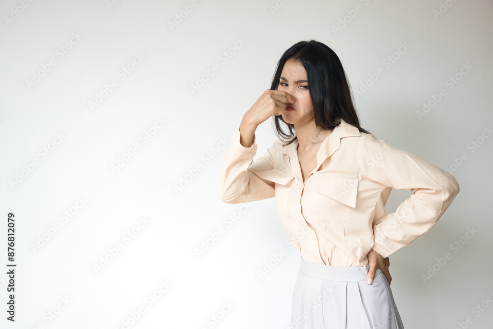 Stinking Odor and Disgusted Expression, Asian Woman Reacting to Unpleasant Smell Concept Image Stinking Odor and Disgusted Expression, Asian Woman Reacting to Unpleasant Smell Concept Image