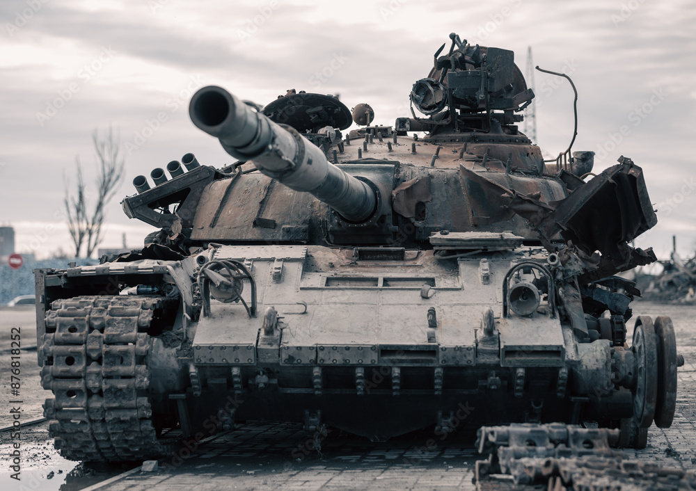 destroyed battle tank in a city lost during the war in Ukraine destroyed battle tank in a city lost during the war in Ukraine