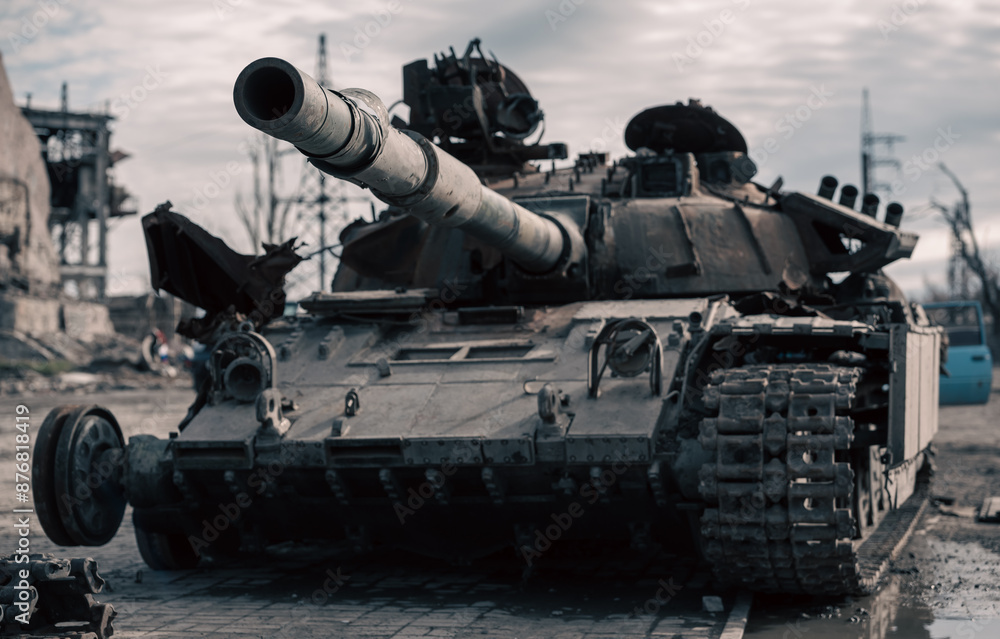 destroyed battle tank in a city lost during the war in Ukraine destroyed battle tank in a city lost during the war in Ukraine