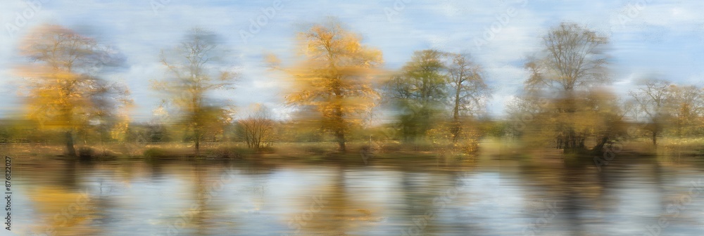 Blurry Autumn Trees by River Blurry Autumn Trees by River