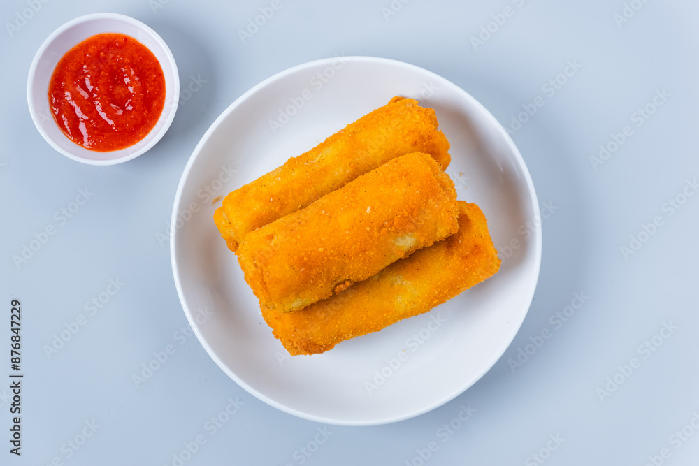 Risol or rissoles. served with chili sauce or chili. perfect for recipe, article, catalogue, promotion, or any cooking contents. with copy space. Risol or rissoles. served with chili sauce or chili. perfect for recipe, article, catalogue, promotion, or any cooking contents. with copy space.
