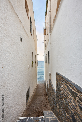 Narrow alley in Costa Brava. Cadaques village, Girona. Catalonia, Spain