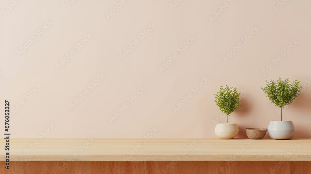 Minimal interior mockup with plants on empty wooden desk with pastel pink wall in background Minimal interior mockup with plants on empty wooden desk with pastel pink wall in background