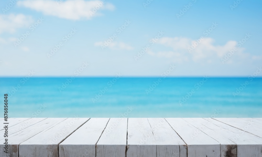 Fototapeta premium White wooden table with blue sea and sky background