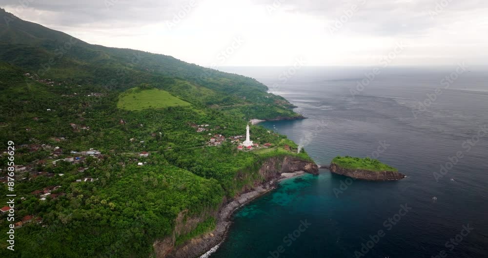 Aerial View Of Gili Selang Lighthouse Overlooking Island And Bay In Bali, Indonesia. pullback shot Aerial View Of Gili Selang Lighthouse Overlooking Island And Bay In Bali, Indonesia. pullback shot