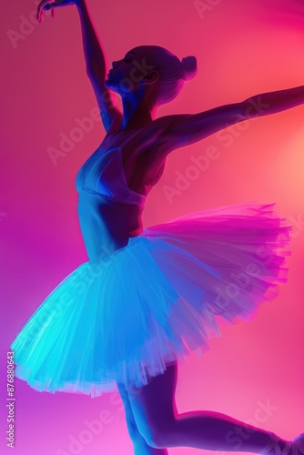 A woman wearing a colorful tutu poses for a photo