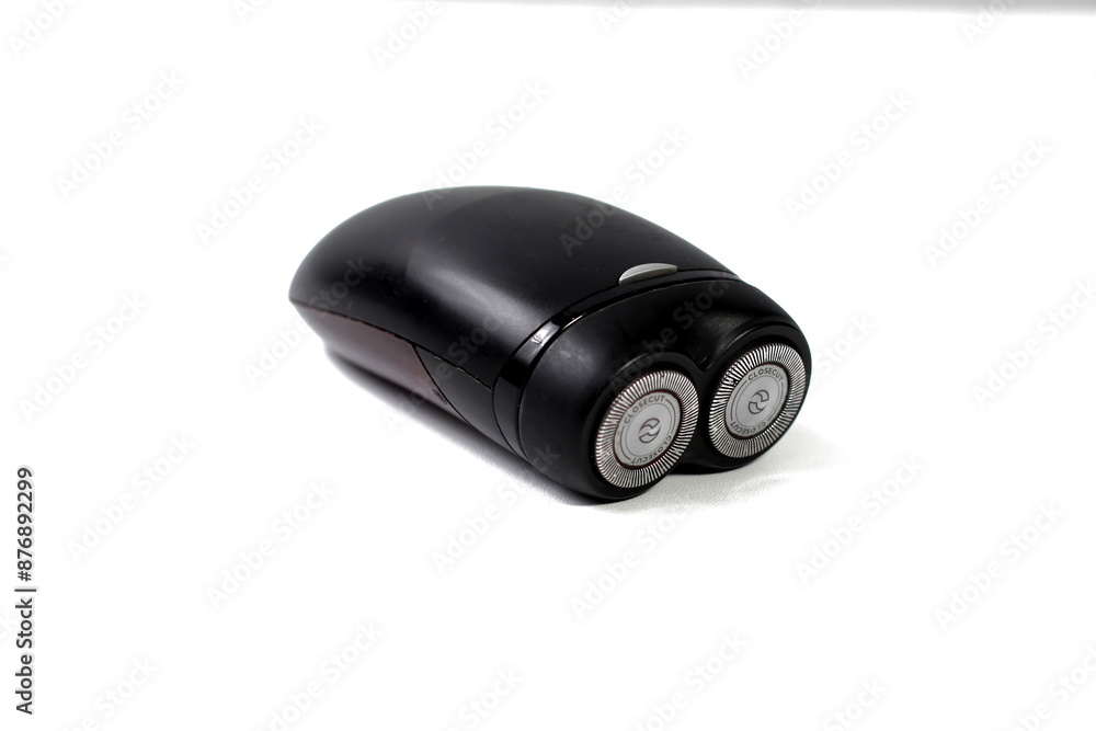 Electric shaver closeup on white background Electric shaver closeup on white background
