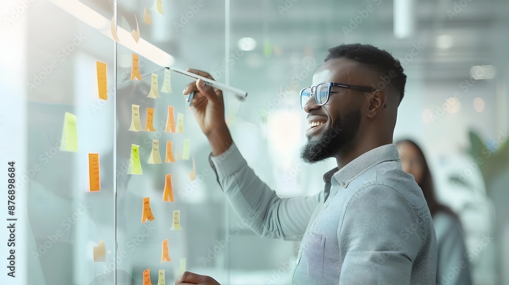 Businessman Brainstorming on Whiteboard in Modern Office Environment Businessman Brainstorming on Whiteboard in Modern Office Environment