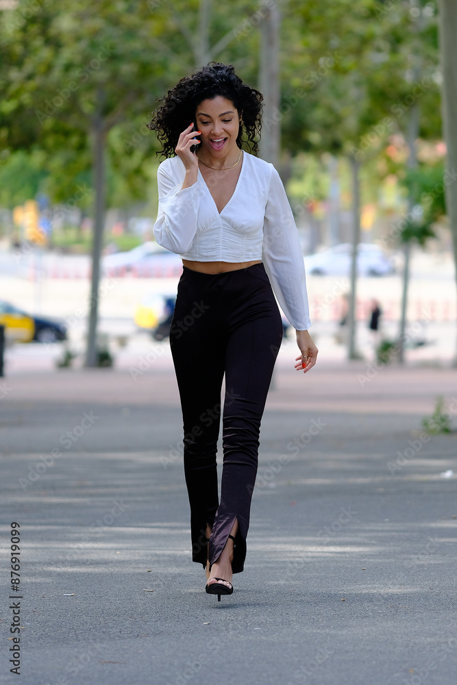 business woman resting on a bench and pacing while talking on the phone about work issues business woman resting on a bench and pacing while talking on the phone about work issues