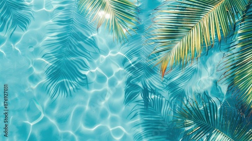 3D rendering of palm leaves shadow on the water surface in a swimming pool with a light blue background