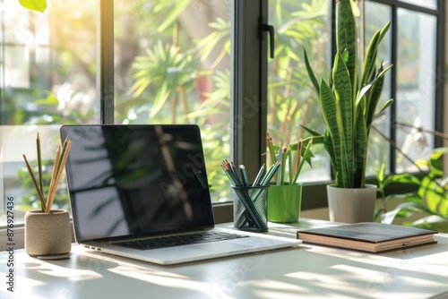 Wallpaper Mural laptop with a blank screen, placed on a clean white desk. office setting Torontodigital.ca