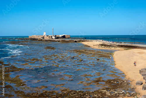 View of the San Sebastian castle, on La Caleta beach, Cadiz, Andalusia, Spain photo